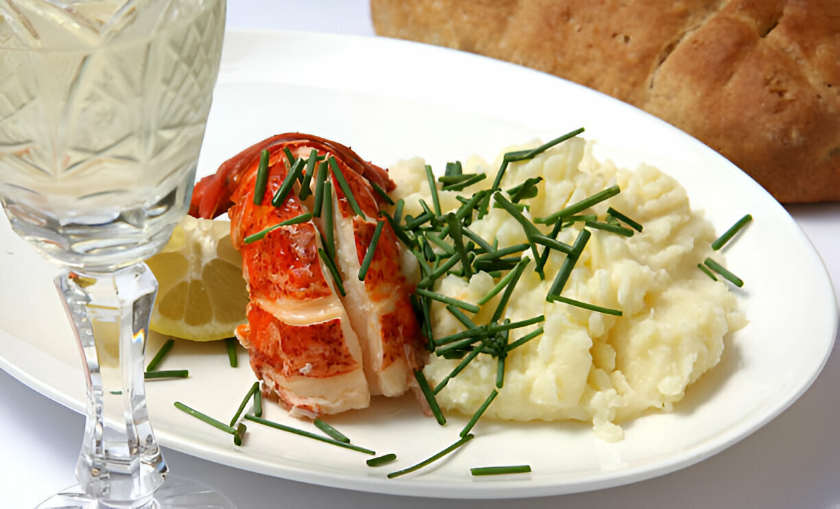 Baked Lobster Tails with Garlic Herb Butter Sauce and Mashed Potatoes