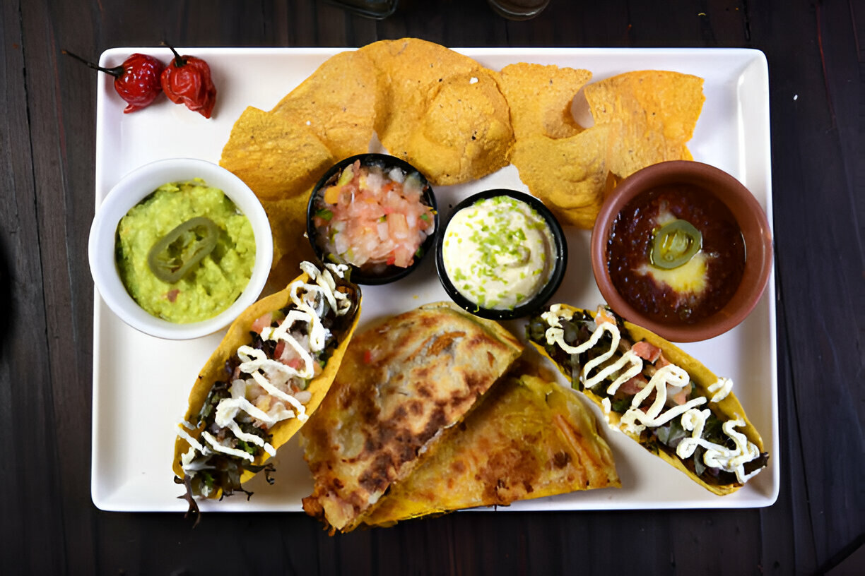 Cheesy Beefy Burrito Delight with Salsa and Sour Cream