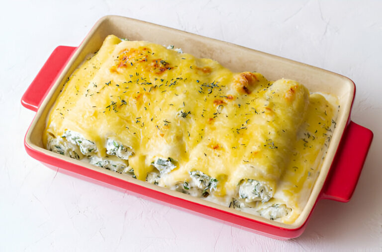 Baked enchiladas with cheese and herbs